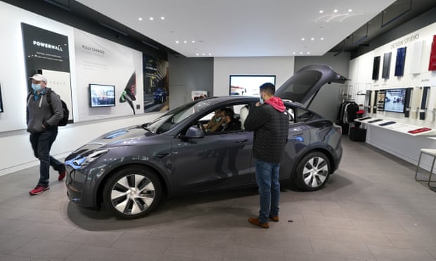 Tesla reports record quarterly profit as electric car sales boom