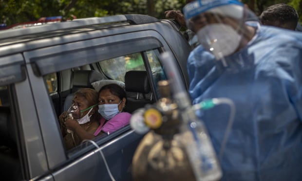 ‘We’re burning pyres all day’: India accused of undercounting deaths